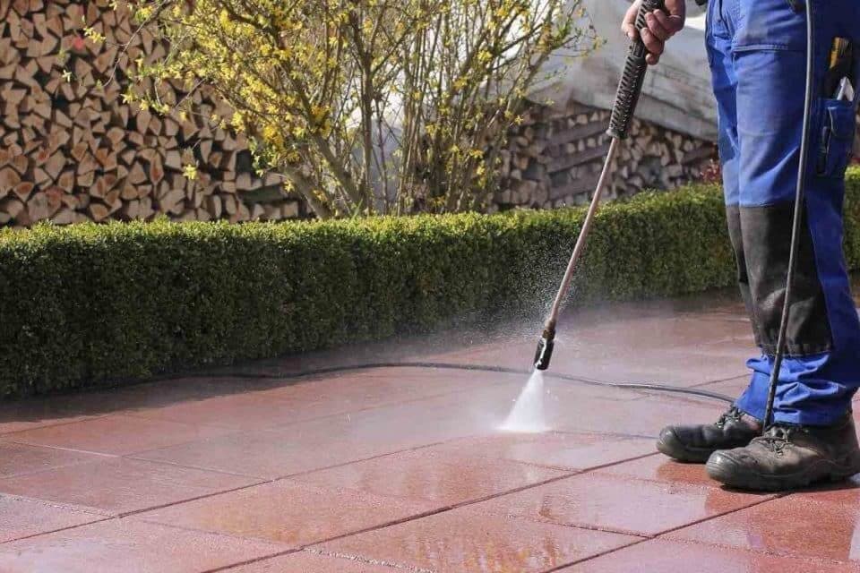 Pressure washing a concrete surface